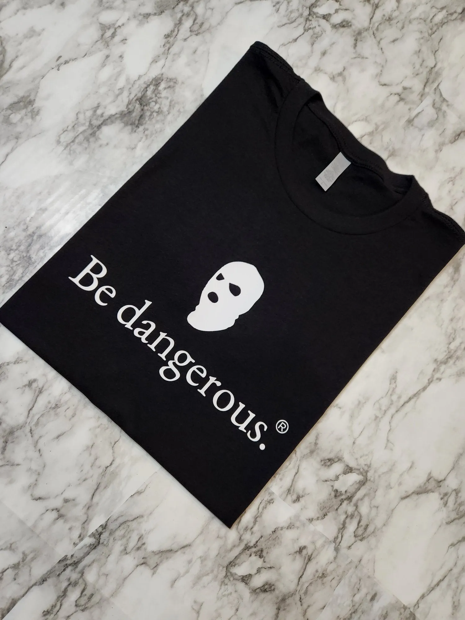 Be dangerous. T-Shirt
