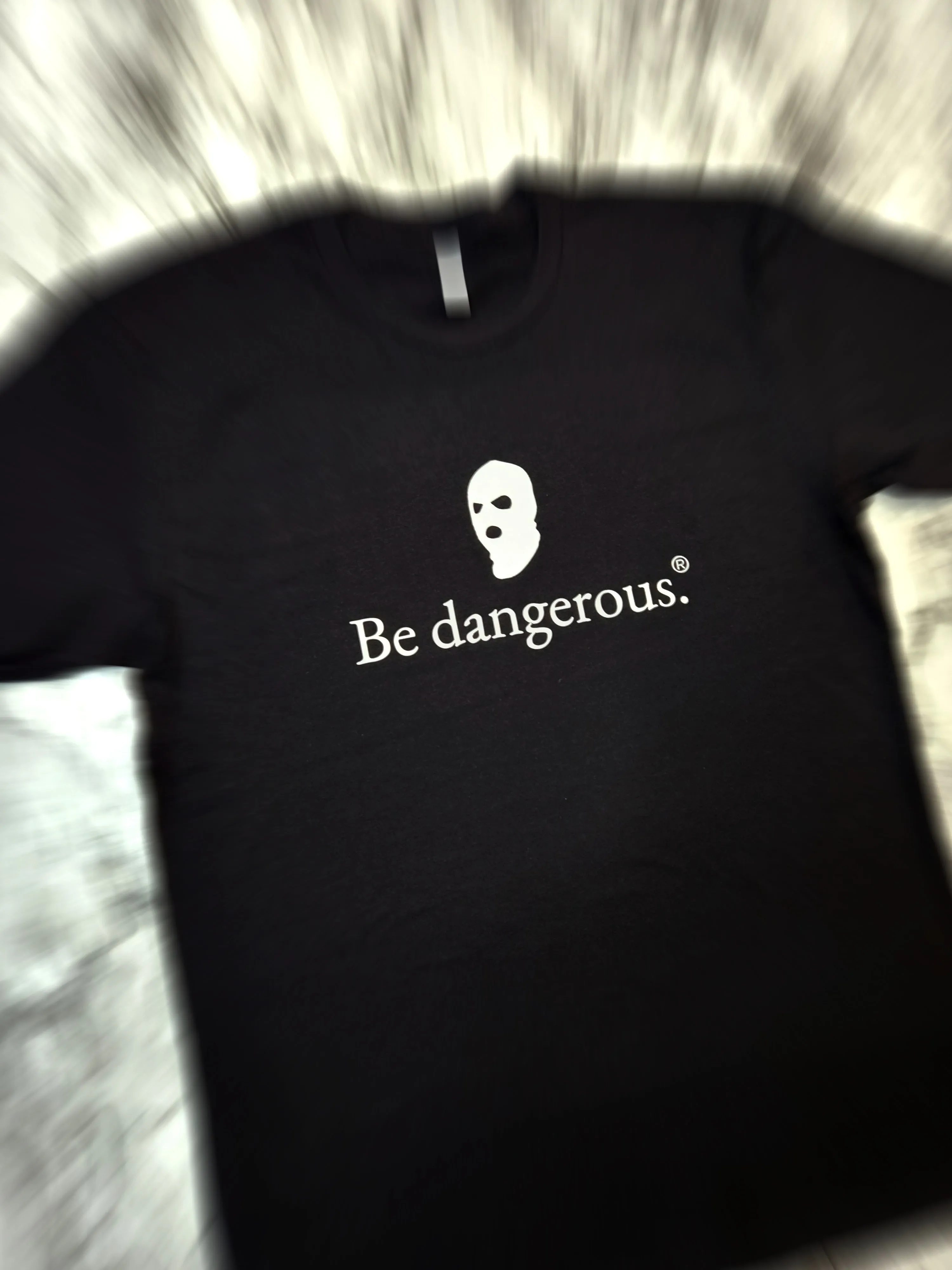 Be dangerous. T-Shirt