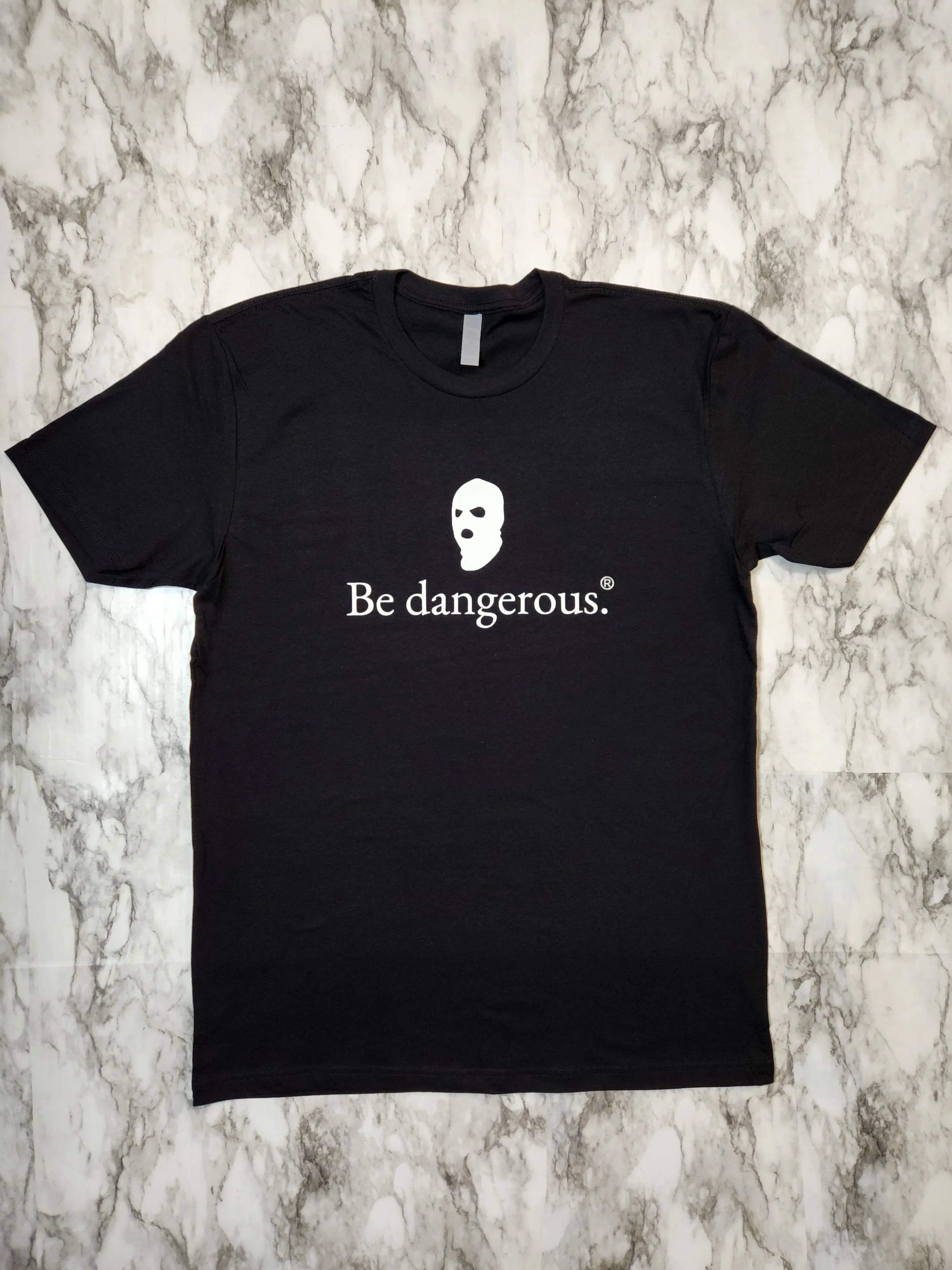 Be dangerous. T-Shirt