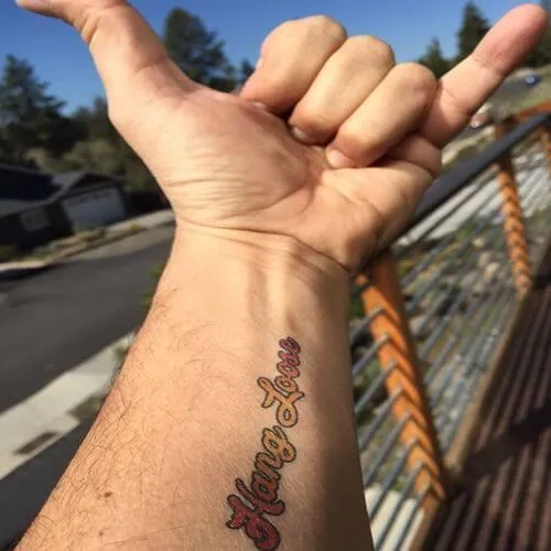 Hang Loose Manifestation Tattoo
