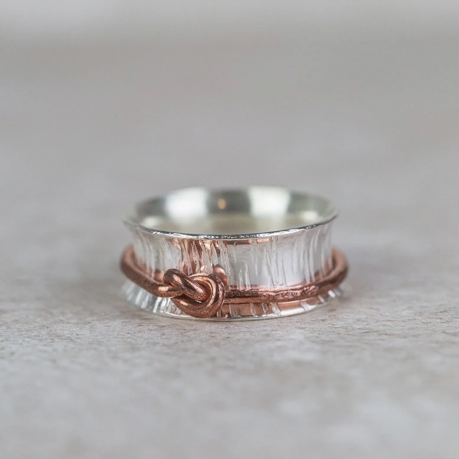 Sterling Silver and Copper Love Knot Spinner Rings